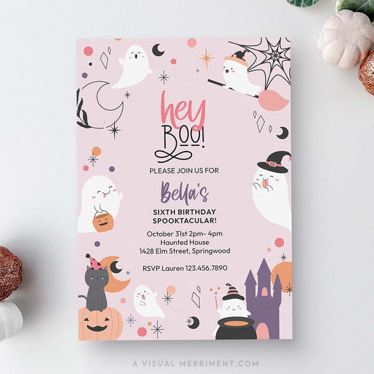 hey boo printable pink ghost Halloween party invitation on white surface with pumpkins