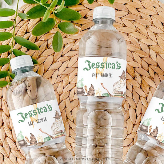 3 bottles with harry potter style baby shower custom water bottle labels in magical elements on grass mat
