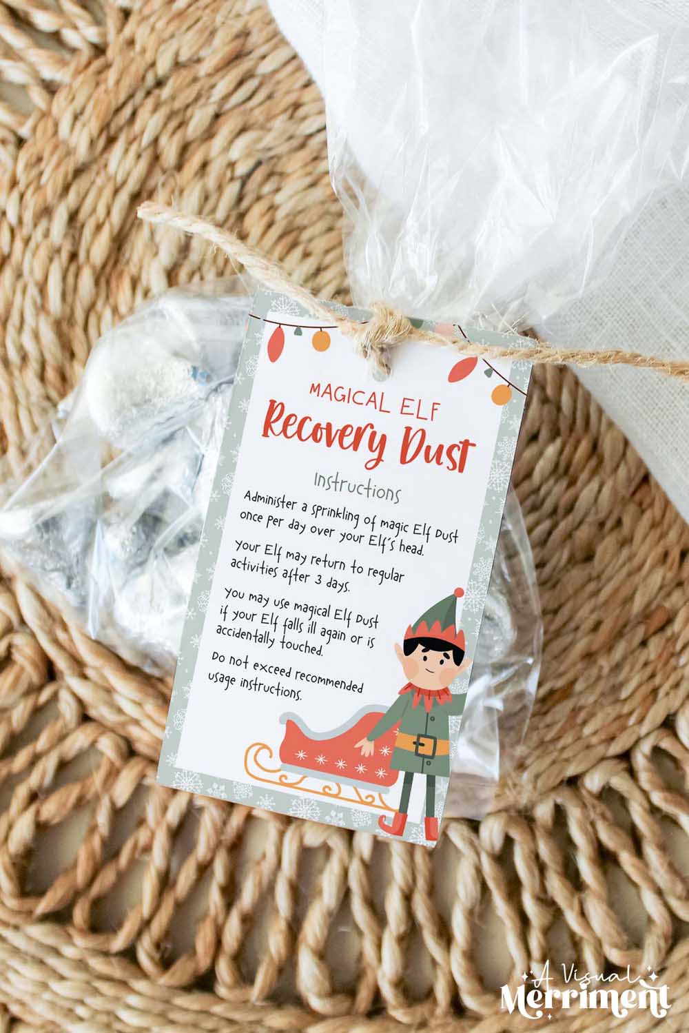 vertical elf on the shelf recovery magic dust gift tag tied to bag of candy treats