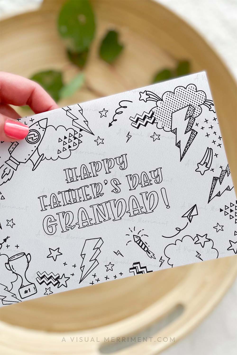 Vertical of Hand holding kids happy father’s day Grandad printable coloring card