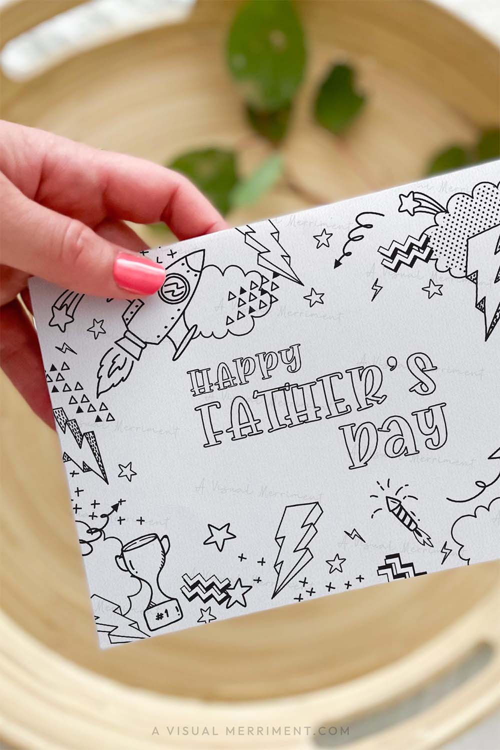 Vertical of Hand holding kids coloring happy fathers day printable card