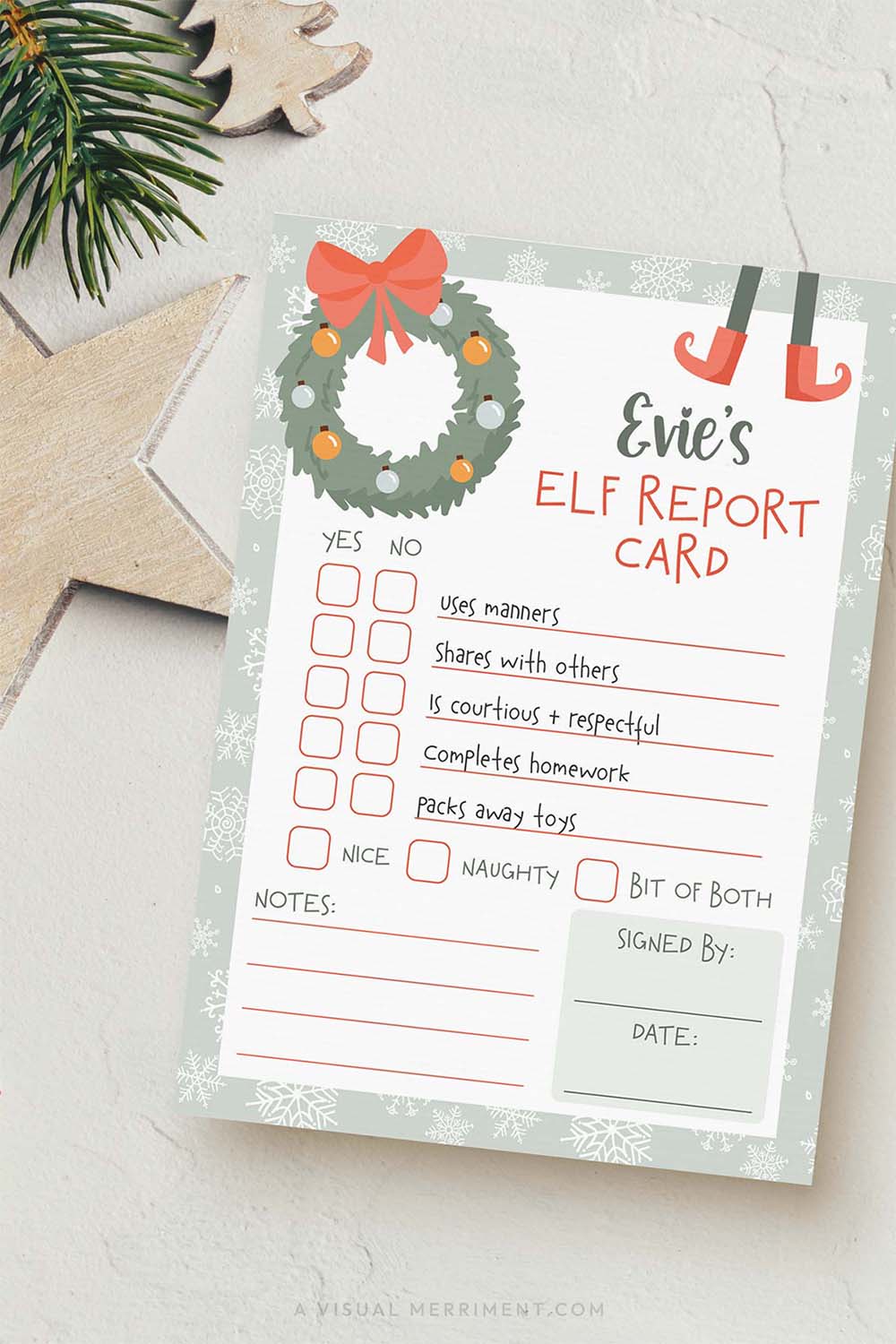 vertical of printable elf on the shelf report card with Christmas decorations