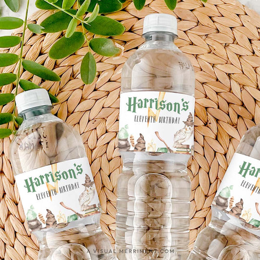 3 bottles with harry potter style custom water bottle labels in magical elements on grass mat with leaves