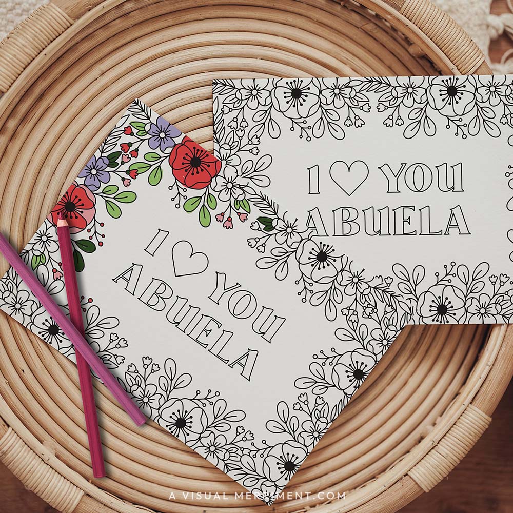 Half colored I love you Abuela grandparents day coloring card with pencils on table