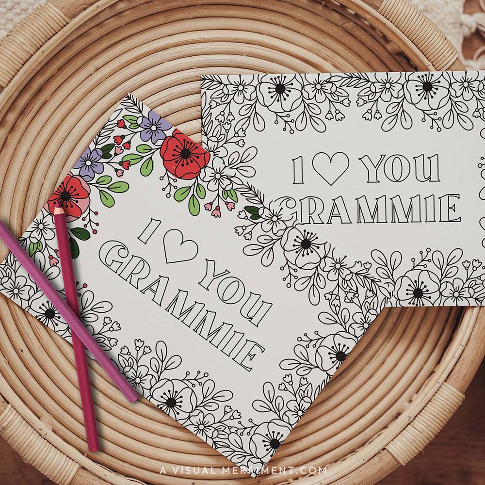Half colored I love you Grammie grandparents day coloring card with pencils on table