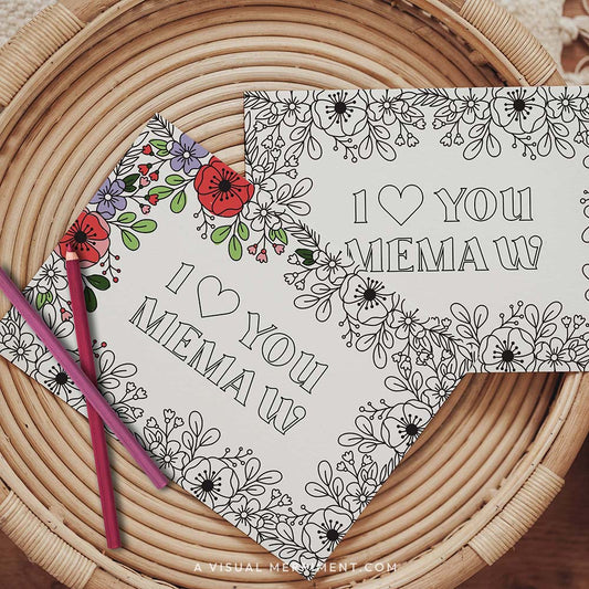 Half colored I love you Memaw grandparents day coloring card with pencils on table