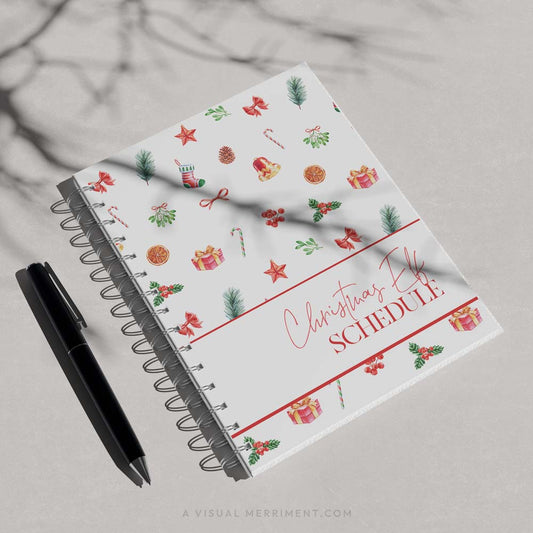 red christmas elf schedule cover page printed on spiral binder with black pen
