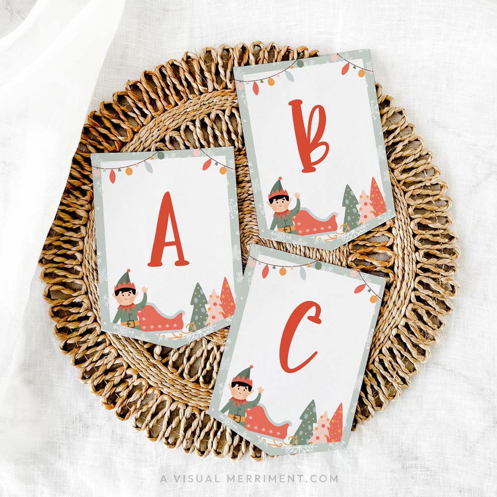 Printed ABC elf on the shelf banner sign laying on mat