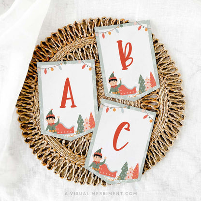 Printed ABC elf on the shelf banner sign laying on mat