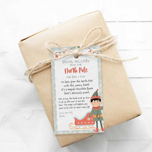 printable christmas elf hot chocolate bomb instructions gift tag on wrapped gift