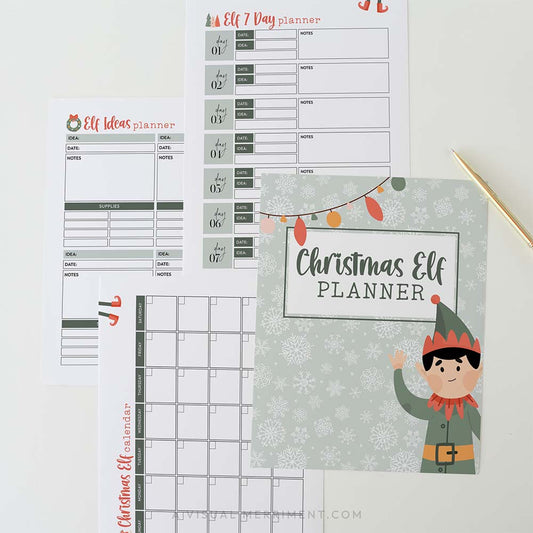 green christmas elf planner bundle pages laid out with gold pen