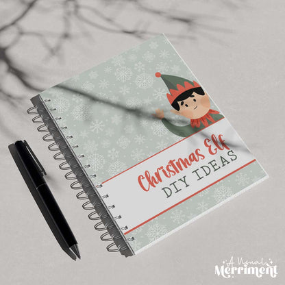 green christmas elf diy ideas planner cover page printed on spiral binder with black pen