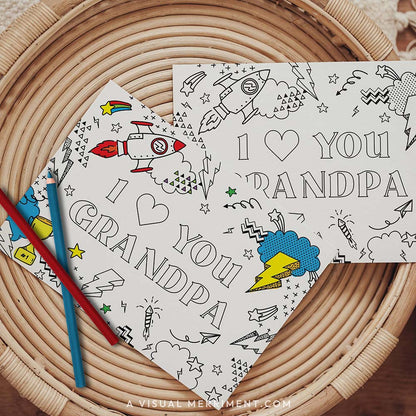 Half colored I love you Grandpa grandparents day coloring card with pencils on table