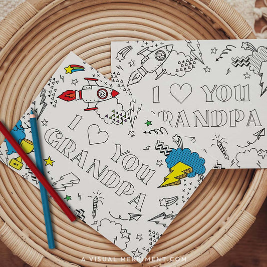 Half colored I love you Grandpa grandparents day coloring card with pencils on table