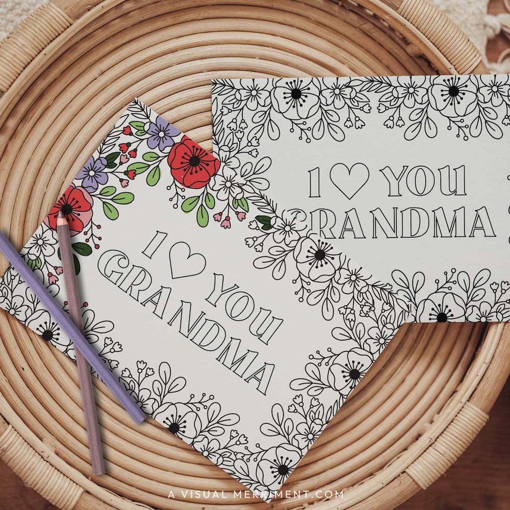 Half colored I love you Grandma grandparents day coloring card with pencils on table