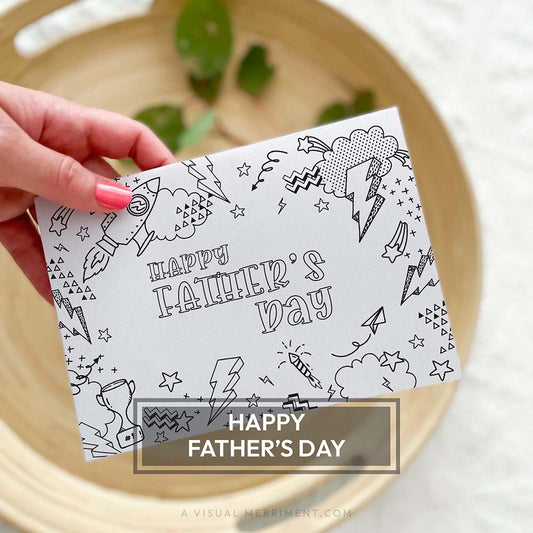 Hand holding kids coloring happy fathers day printable card