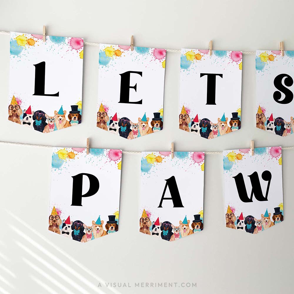 Lets pawty dog party banner with paint splatters and party dog flags hanging with pegs
