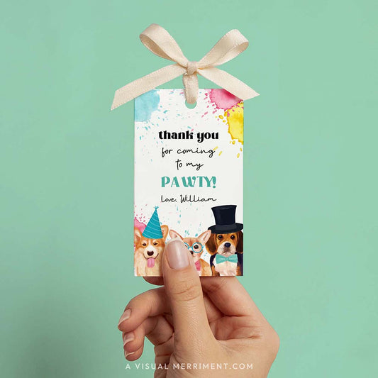 Hand holding Chihuahua and friends party favor gift tag with party dogs and paint splatters