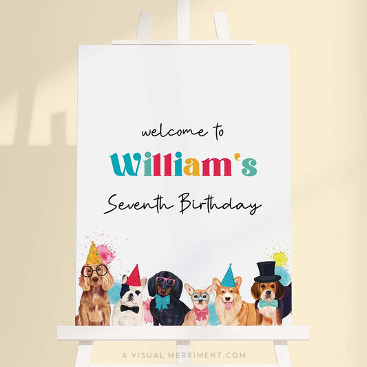 Large colorful welcome birthday sign with party dogs wearing party hats on a white easel