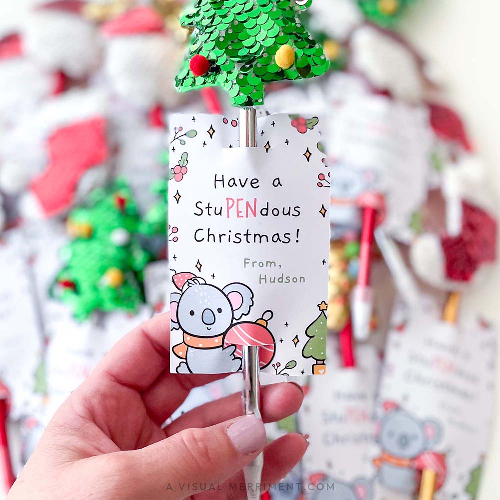 hand holding a christmas pen gift tag template with koala 'have a stupendous christmas'