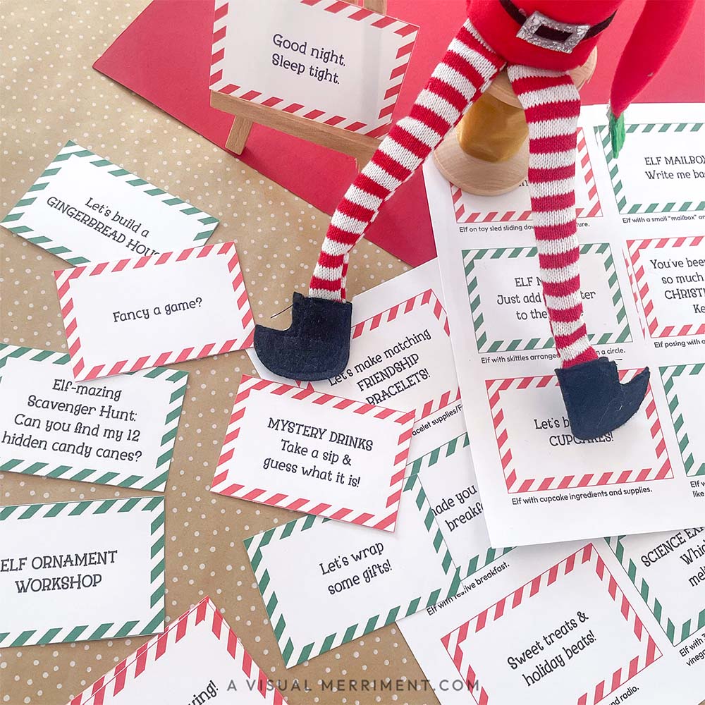 printed activity & kindness elf on the shelf props signs on easel next to elf doll