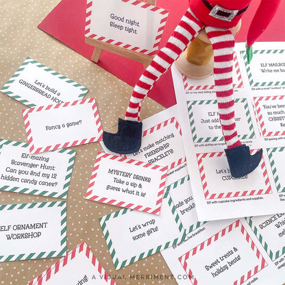 printed activity & kindness elf on the shelf props signs on easel next to elf doll