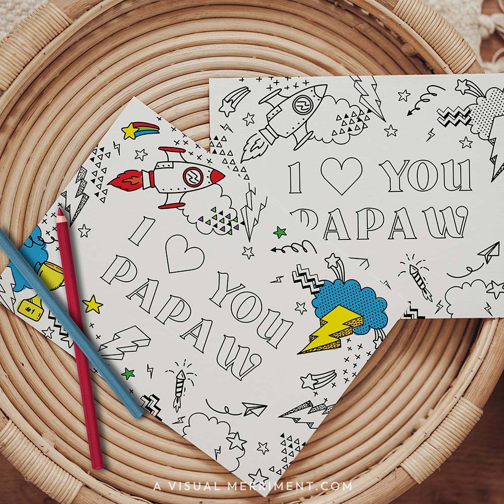 Half colored I love you papaw grandparents day coloring card with pencils on table
