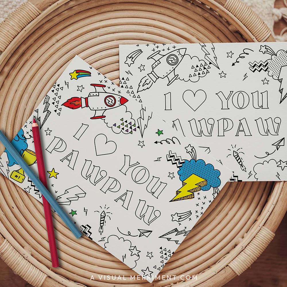 Half colored I love you pawpaw grandparents day coloring card with pencils on table