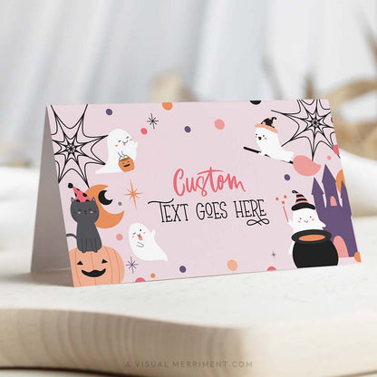 pink halloween food place card with ghost and celestial design, includes 'custom text goes here' text 