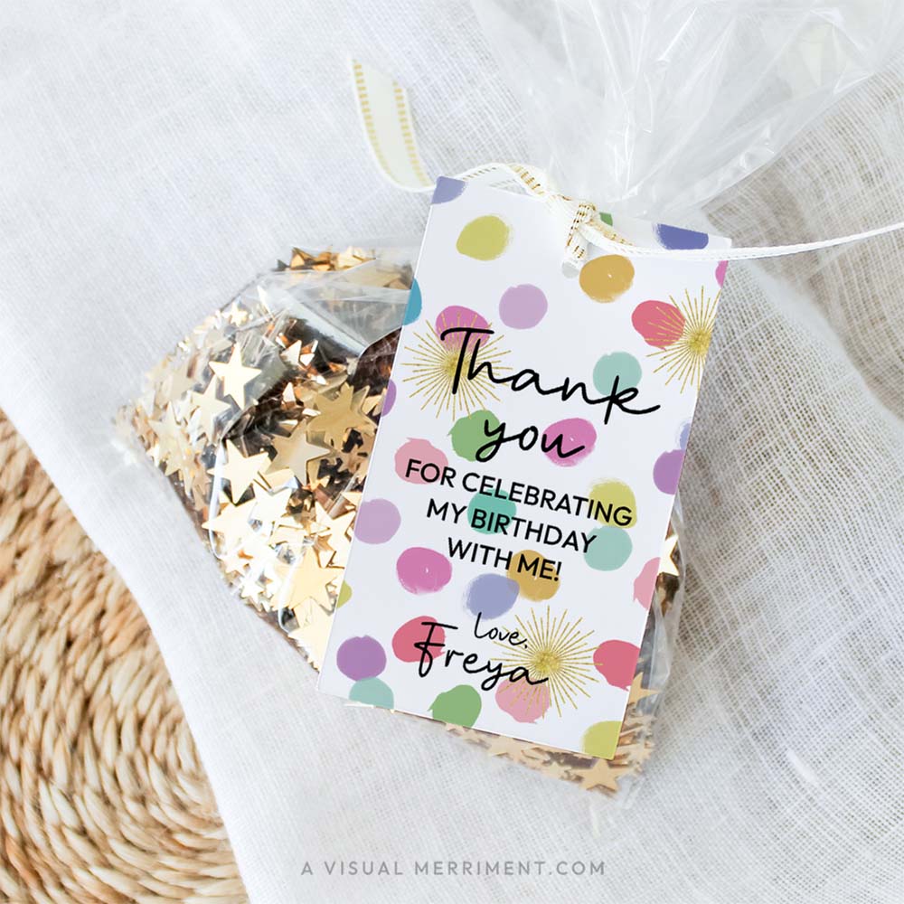 Bag of gold sequins on a mat with a colorful rainbow confetti editable gift tag template