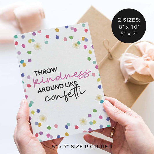 hands holding ‘throw kindness around like confetti’ wedding sign with rainbow confetti polka dot design