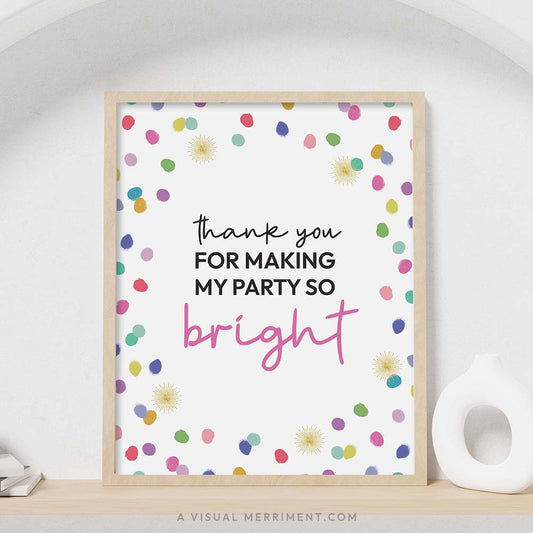 colorful rainbow confetti polka dots ‘Thank you for making my party bright’ party sign in a frame sitting on a shelf