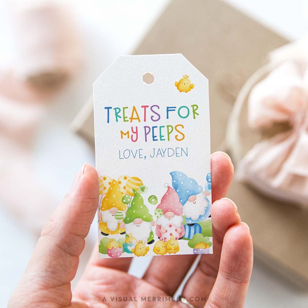 Hand holding a personalized Easter gift tag treats for my peeps with a gnome design