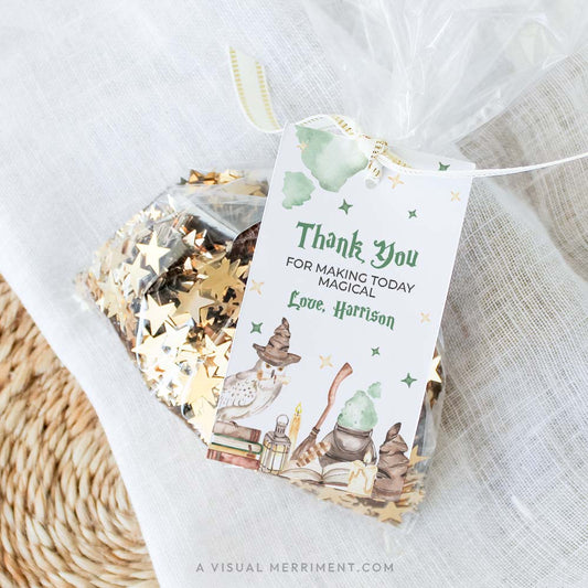 Harry potter style printable gift tag template with wizard school elements attached to bag of sequins
