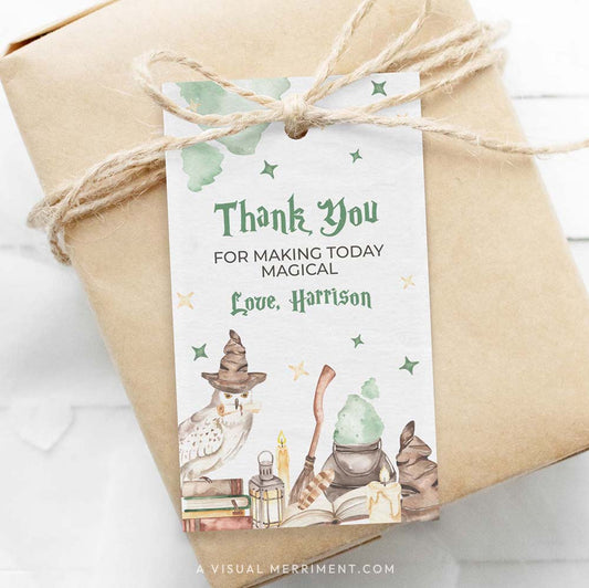 Harry potter style printable gift tag template with wizard school elements on wrapped gift