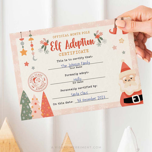 hand holding gril elf on the shelf adoption certificate above christmas tree decor