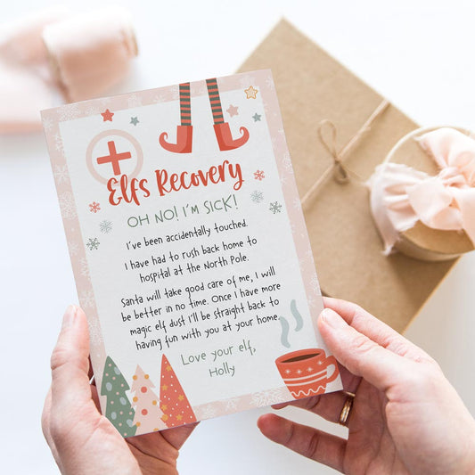 hands holding pink elf on the shelf accidentally touched letter