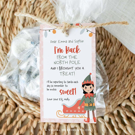 girl elf on the shelf i’m back gift tag tied to bag of candy treats