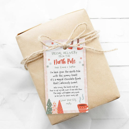 editable pink christmas elf hot chocolate bomb instructions gift tag on wrapped gift