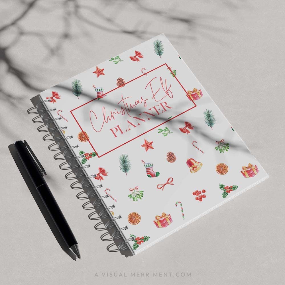 red christmas elf planner cover page printed on spiral binder with black pen