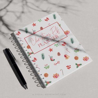 red christmas elf planner cover page printed on spiral binder with black pen