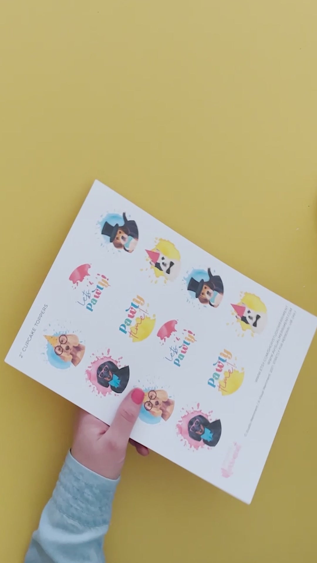 video of cutting and assembling party dog printable cupcake toppers