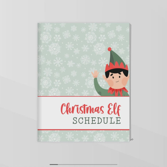 Video flipping through green christmas elf planner schedule 17 pages