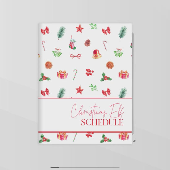 Video flipping through red christmas elf schedule planner 17 pages