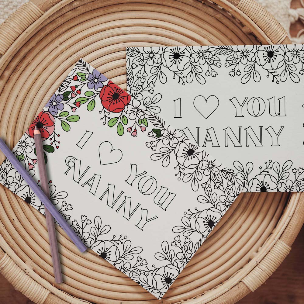 Half colored I love you Nanny grandparents day coloring card with pencils on table