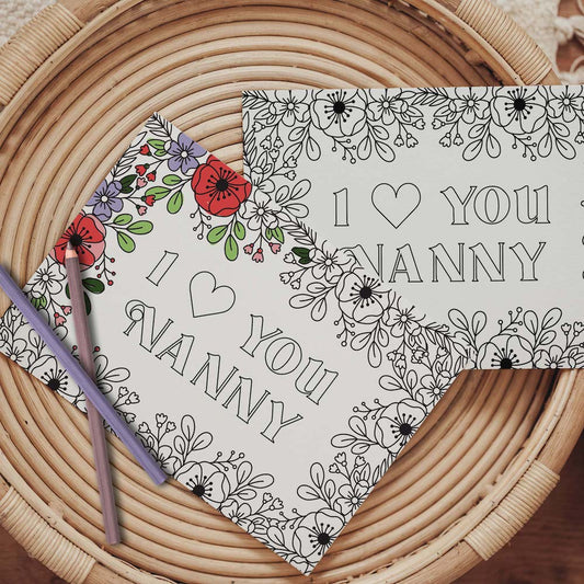 Half colored I love you Nanny grandparents day coloring card with pencils on table