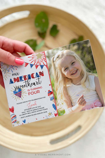 vertical of hand holding american sweetheart 4th of july invitation with image of girl
