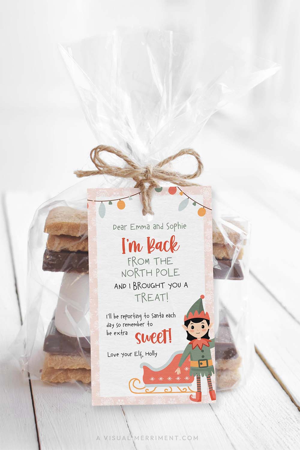 vertical Printable pink elf on the shelf i'm back with a treat gift tag on bag of smore treats