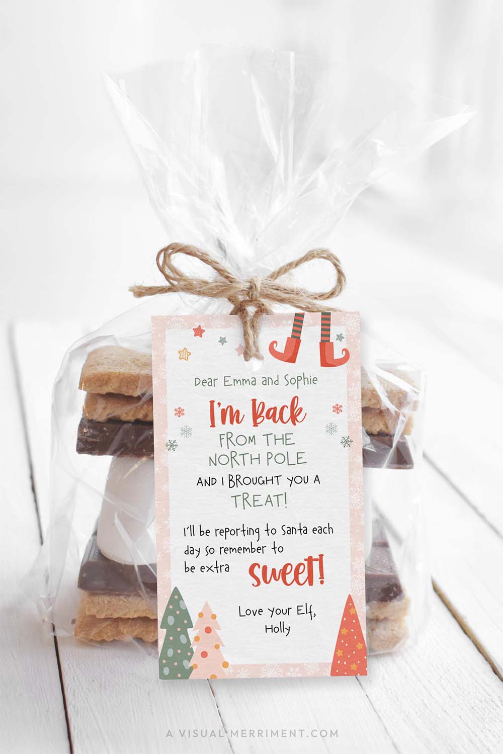 vertical Printable girl elf on the shelf i’m back gift tag on bag of smore treats