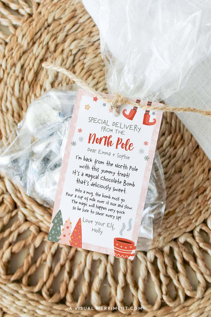 vertical girl elf on the shelf hot chocolate instructions gift tag tied to bag of candy treats